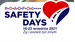 Na zdjęciu logo kampanii, tj. napis ROAD SAFETY DAYS 16-22 września 2021 Żyj i pozwól żyć innym . z Praweej strony rysunek serca koloru czerwono- granatowego, przez środek przerwyana linia imitująca drogę