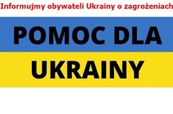 Na zdjęciu flaka niebiesko żółta na której widać czarny napis Pomoc dla Ukrainy. Powyżej widnieje napis Informujemy obywateli Ukrainy o zagrożeniach