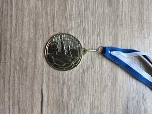 zdjęcie przedstawia medal