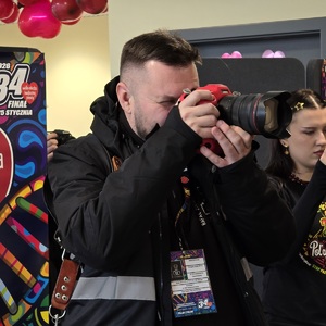 zdjęcie przedstawia fotografa